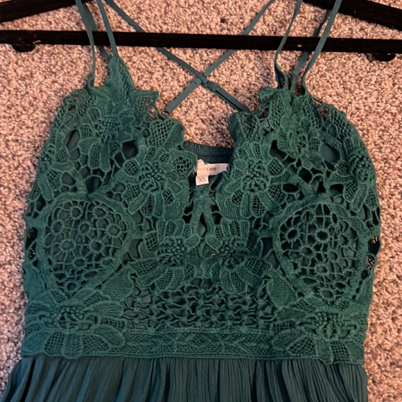 Turquoise, peplum top - Picture 2 of 2